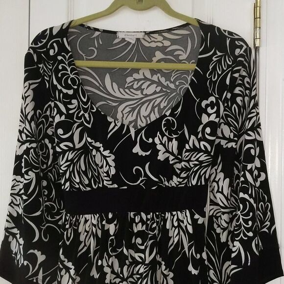 Dress barn black white top
Sz L
EUC - Picture 3 of 7